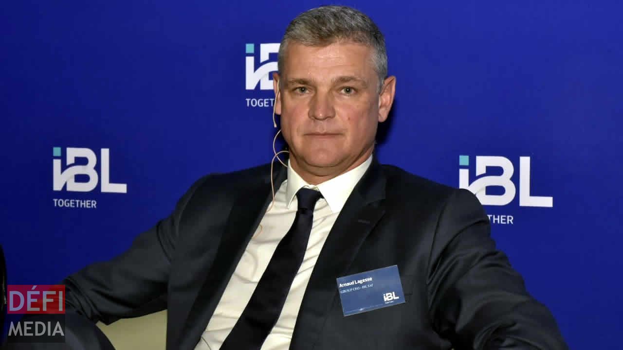 Arnaud Lagesse seated at an IBL Together branded panel discussion in Mauritius